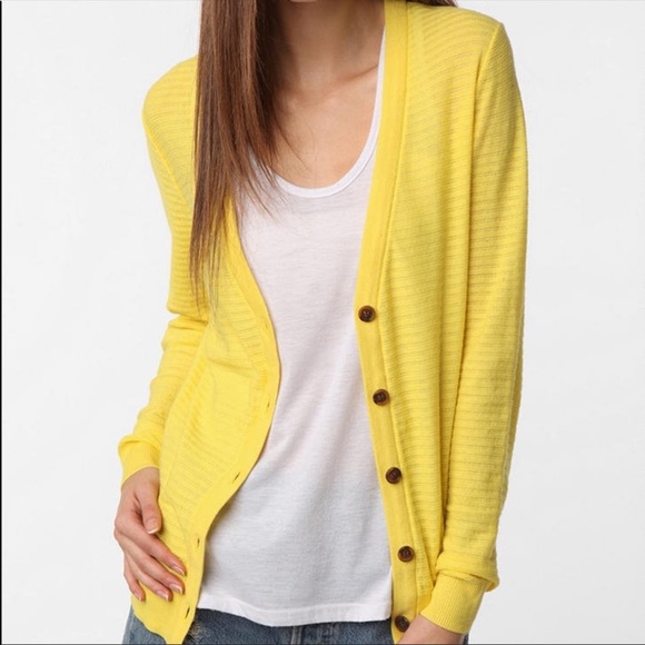 yellow button down sweater